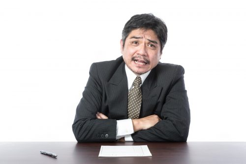 圧迫面接官